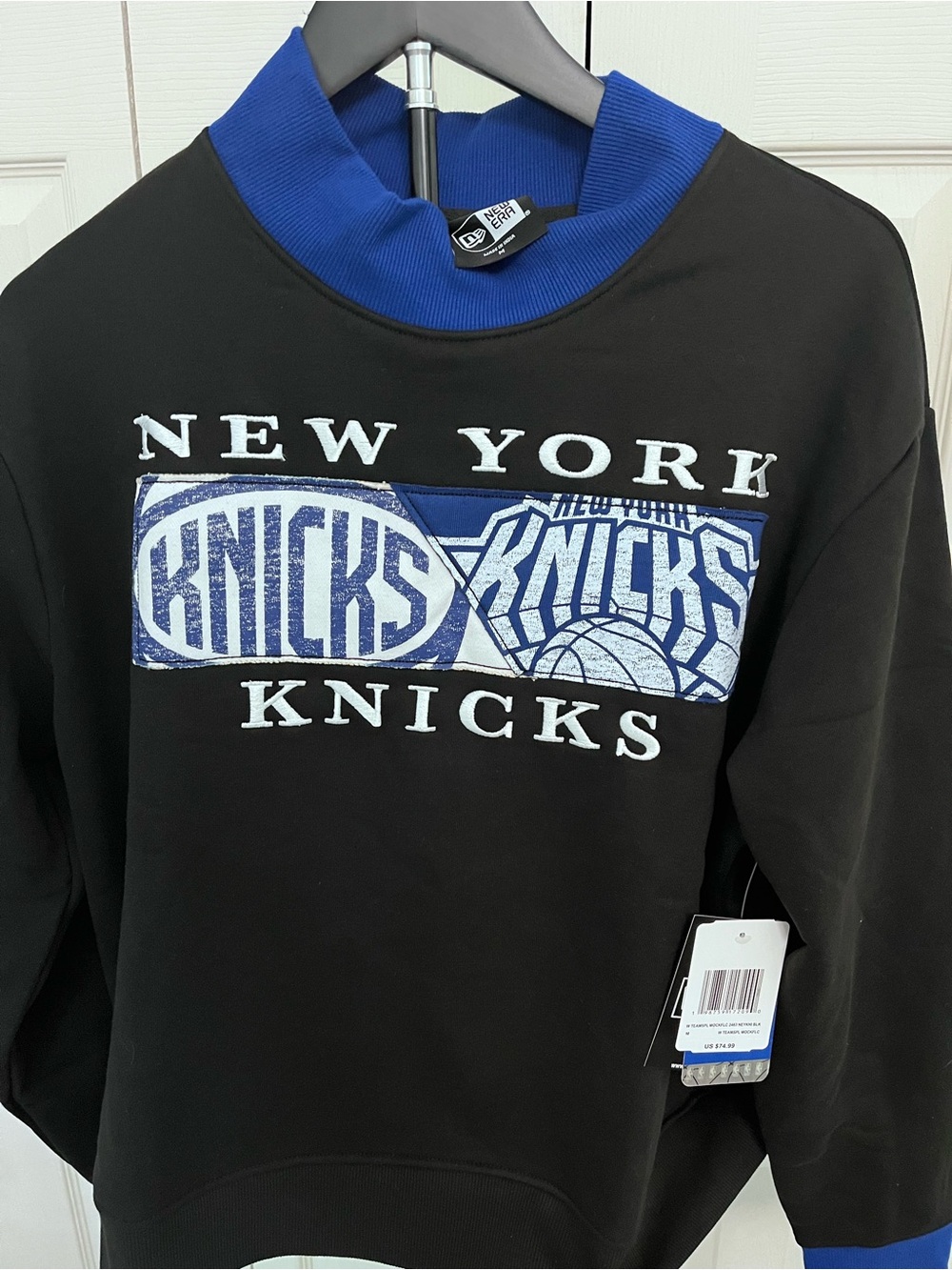 New Era Black Crewneck with Blue and White Knicks Chest Logo